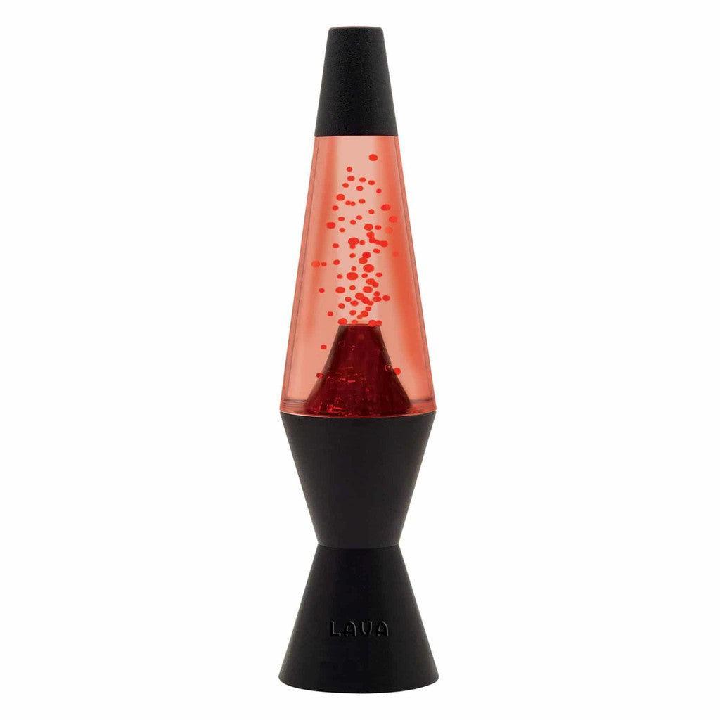 A red lava lamp with a black base and top cap, resembling a volcano, features mesmerizing red wax blobs floating in the liquid.