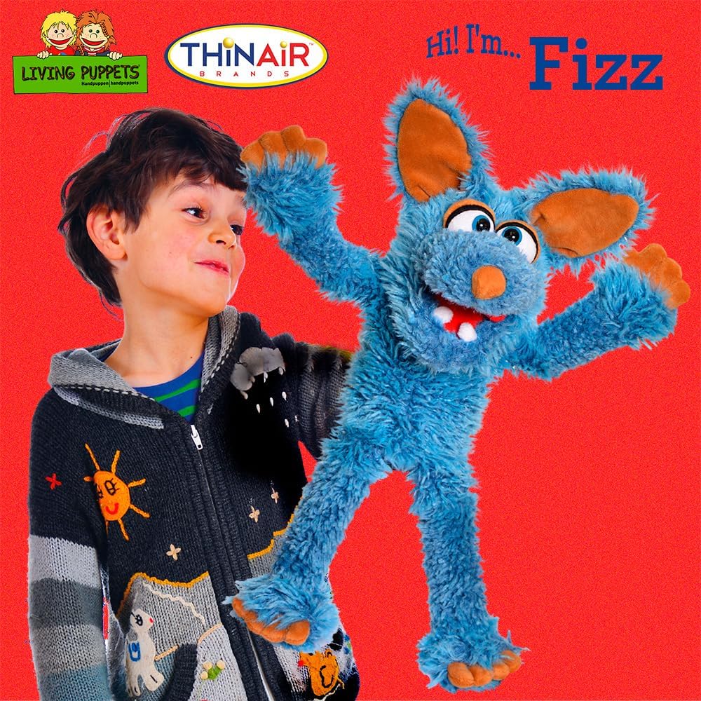 Child with Fizz The Blue Dog, a plush hand puppet, on a red background, featuring the "Living Puppets" and "Thin Air Brands" logos.