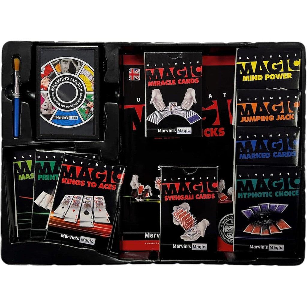 Discover the ultimate Magic Card Set: a box brimming with various magic trick sets, including Miracle Cards, Mind Power, Jumping Jack, Kings to Aces, Svengali Cards, and Hypnotic Choice. Plus, it features a brush and spinner for even more magical moments.