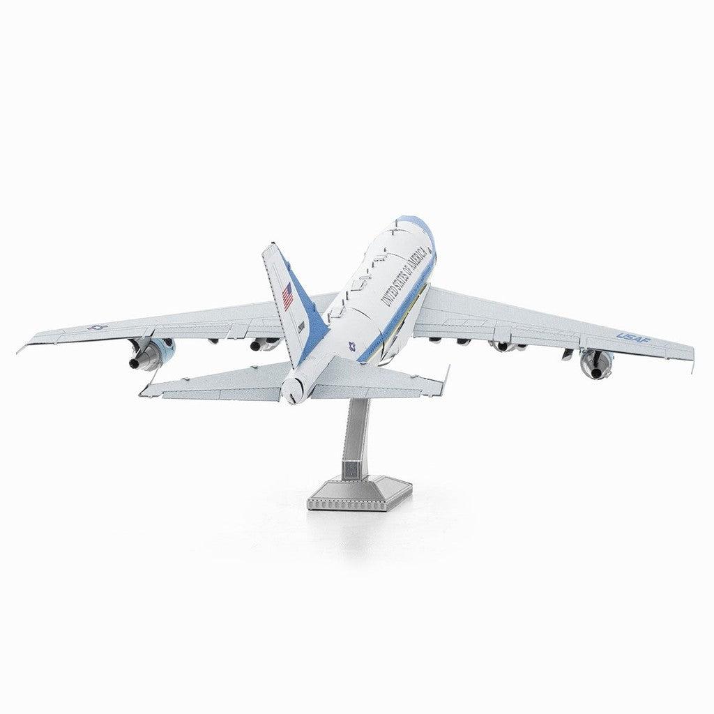 image shows a model silver and blue model airplane