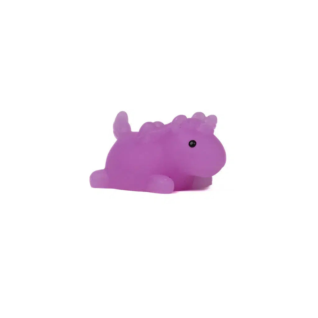 A Toysmith purple rubber dinosaur toy featuring small bumps on its back, lying on a white background.