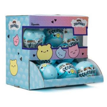 This Toysmith display box of Squishies collectibles showcases a delightful assortment of blue balls, each with adorable illustrated faces on the packaging. Discover the surprise within every blind capsule, making the unboxing experience even more exciting!.