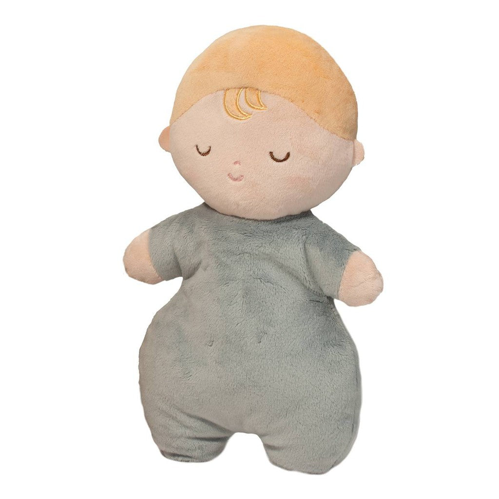 A cuddly Baby doll with a beige face and closed eyes, featuring short light brown hair, wearing a soft green outfit.