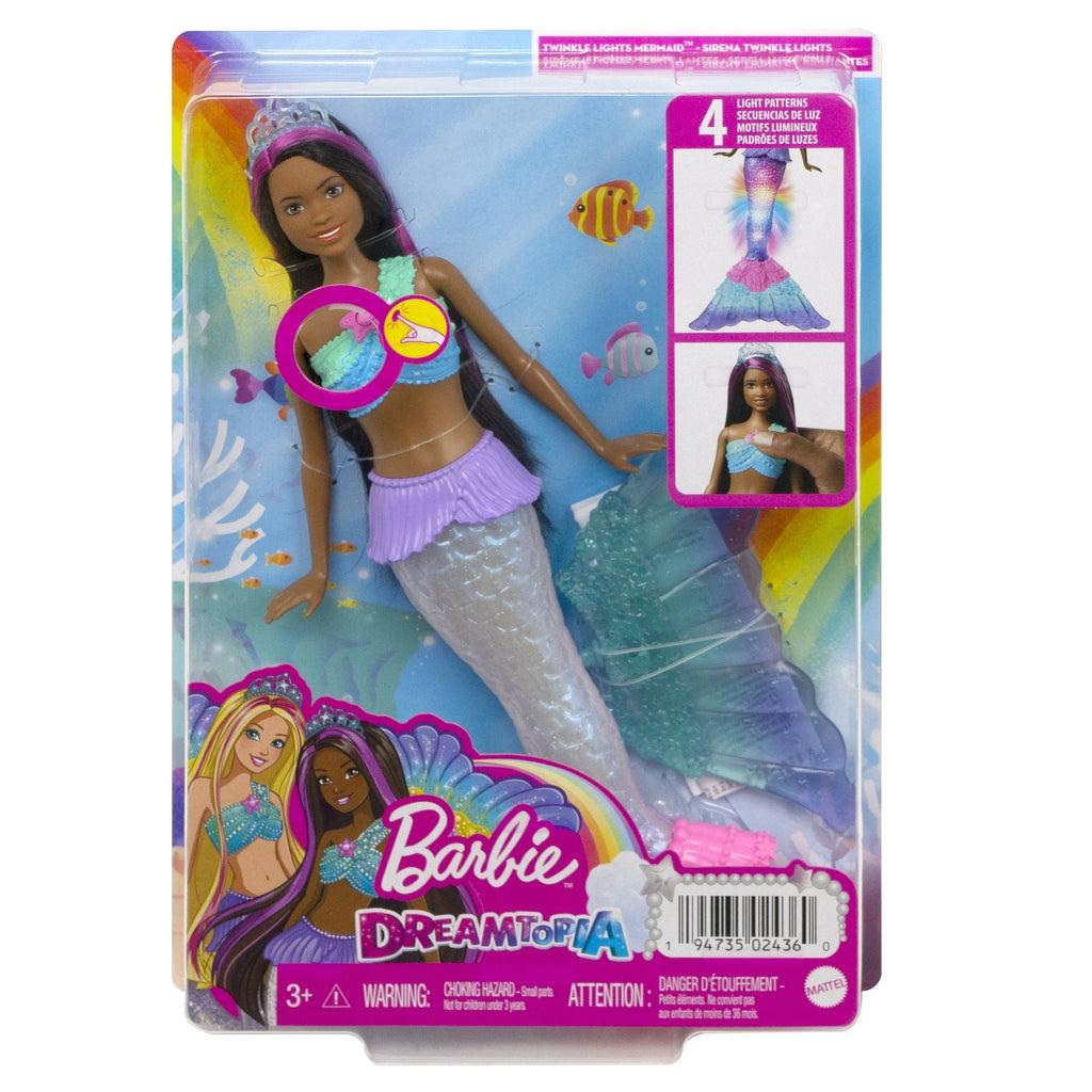 Image of the packaging for the Barbie Dreamtopia Twinkle Lights Mermaid Doll. The front is made from clear plastic so you can see the doll inside.