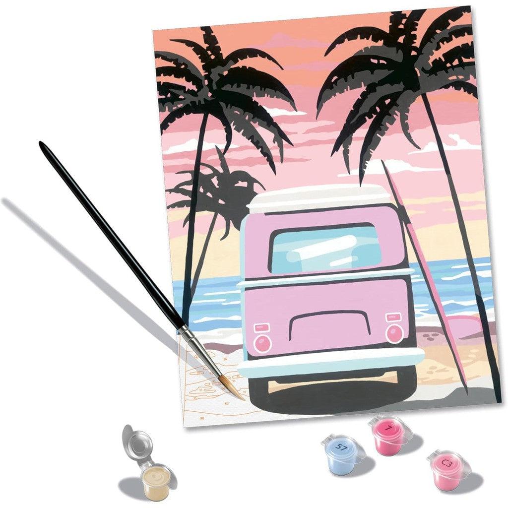 Experience the tranquility of the Ravensburger Beach Life paint-by-numbers kit, where a pink van, palm trees, and a sunset beach scene come to life. This Painting Arts and Crafts set includes a brush and three small paint pots in soothing beige, blue, and pink for your creative delight.