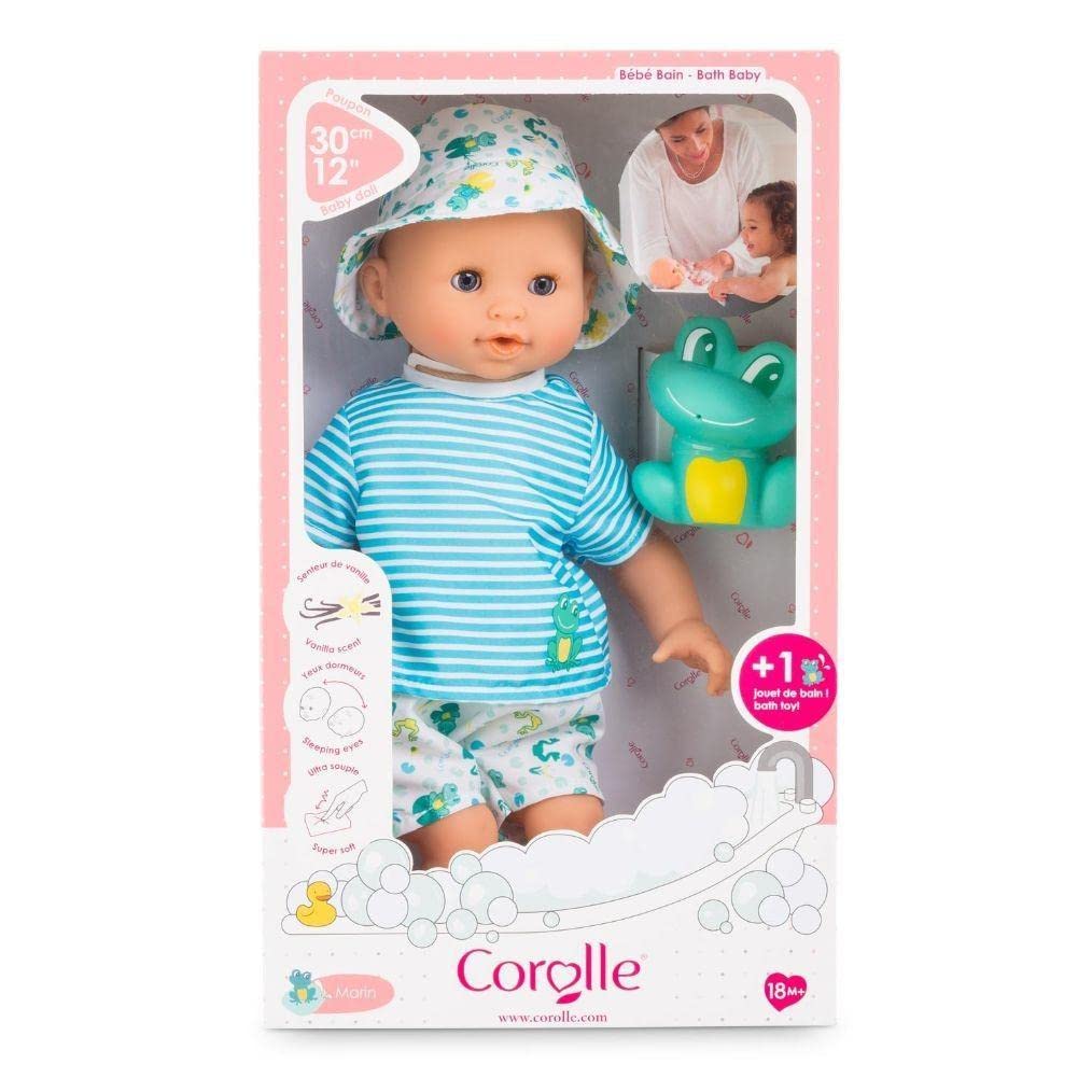 Doll in a bathing outfit with a frog toy, inside a Corolle brand packaging.