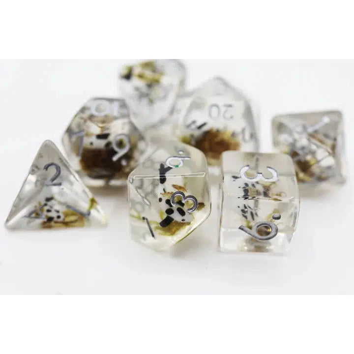 A transparent die adorned with black numbers and small insects embedded inside, perfect for adding a unique twist to your Dungeons and Dragons adventures or other Role Playing Games.