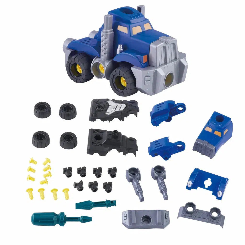 A disassembled chunky vehicle toy truck, crafted from nontoxic plastic, features various parts like wheels, screws, a screwdriver, and blue and gray components, all neatly laid out on a white surface—a perfect piece for "My World My Play".