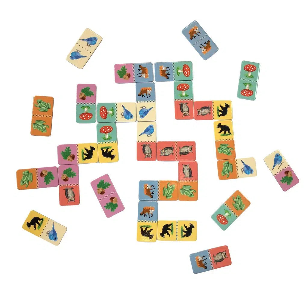 domino pieces spread out illustrated with woodland creatures 