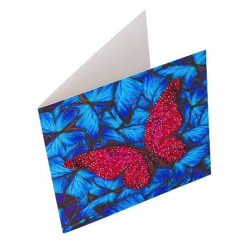 Card decorated with blue butterflies and a diy crystal pink butterfly