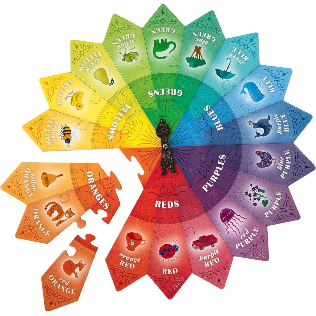 A colorful circular color wheel puzzle, perfect for an educational cooperative children's game. It features sections for yellows, greens, blues, purples, and reds with animals and shades related to each color—ideal for engaging play in the world of toys &amp; games.