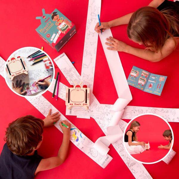 children drawing on the scrolls of paper