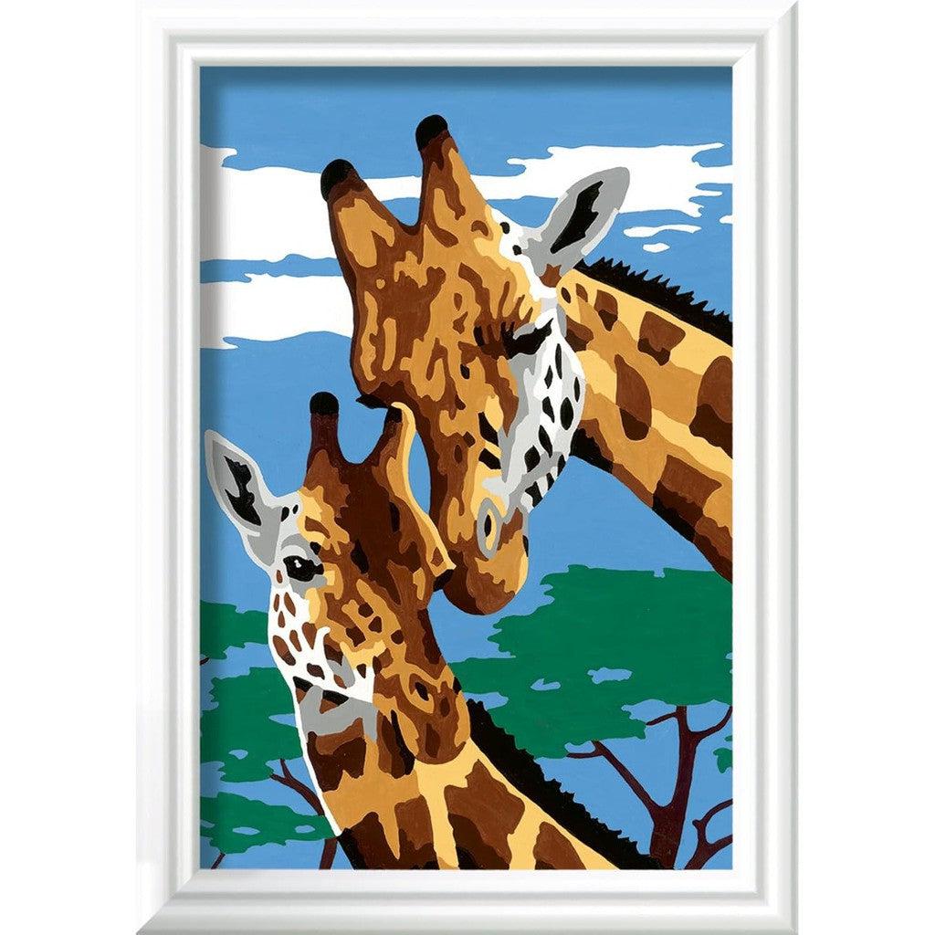 Illustration of Ravensburger Cute Giraffes nuzzling against a blue sky with clouds and green trees, capturing the essence of a whimsical scene perfect for arts and crafts enthusiasts.