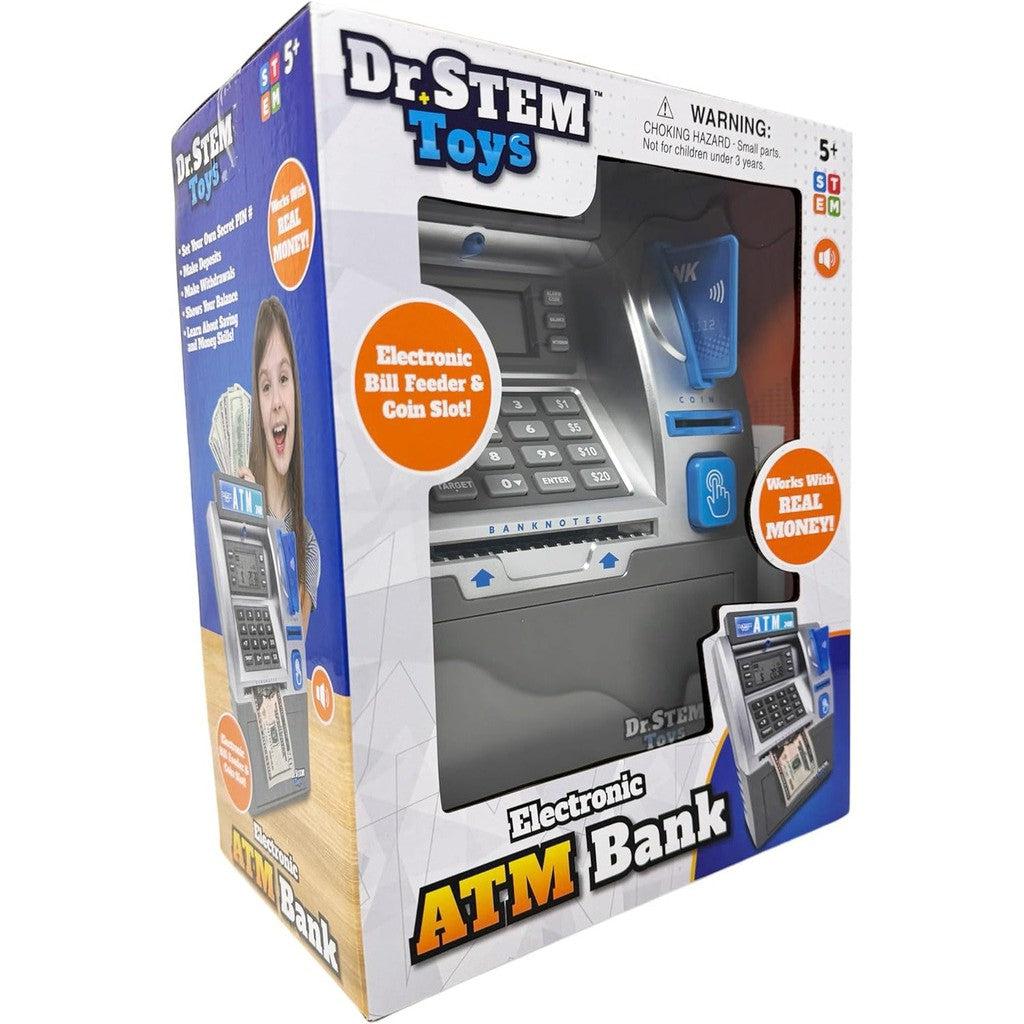 Packaging of a Dr. STEM Toys Electronic ATM Bank, featuring a STEM Toy ATM with a bill feeder and coin slot, perfect for young savers in the Kids ATM Savings Bank series.