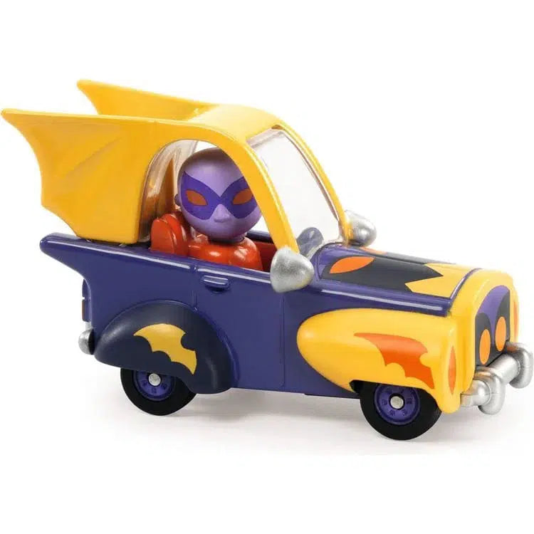 Introducing the Dingo Mobile, a crazy car featuring bat wings and a masked driver. Adorned in vibrant purple and yellow hues, it boasts an ultrasonic metallic paint finish that dazzles as it speeds ahead.