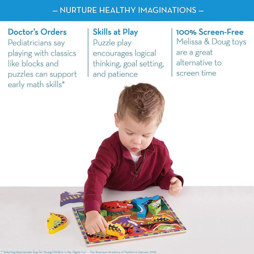 Scene of a little boy playing with the wooden puzzle board.