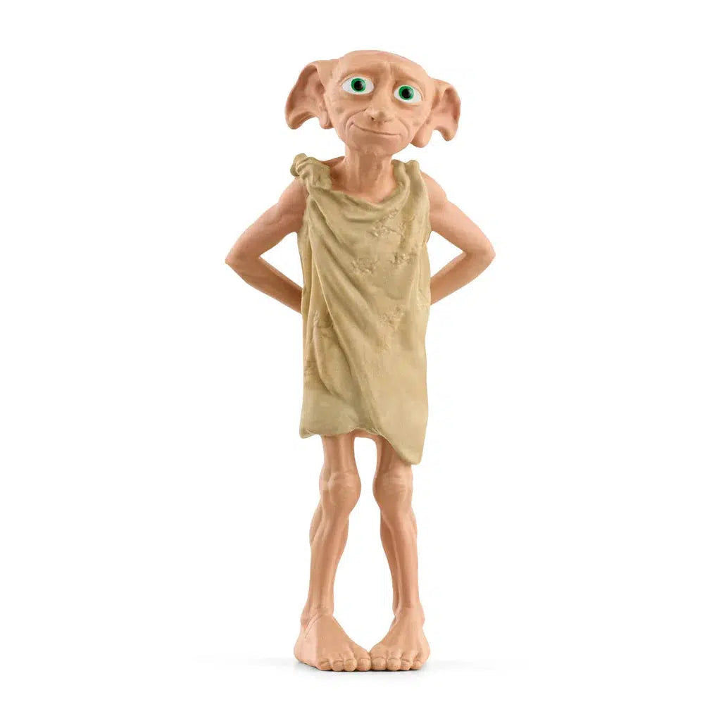 The house-elf Dobby™ is only dressed in a pillowcase and hides his arms behind his back. With his big ears, pointed nose, and green eyes, Dobby™ looks at you kindly.