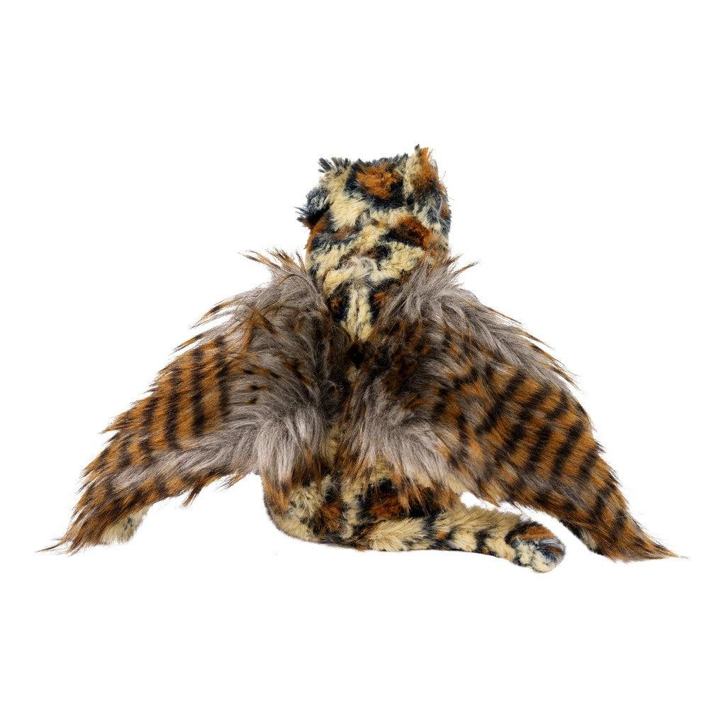 Plush toy with a patterned body and large feathered wings, resembling a mythical creature. The colors are a mix of brown, orange, and black.