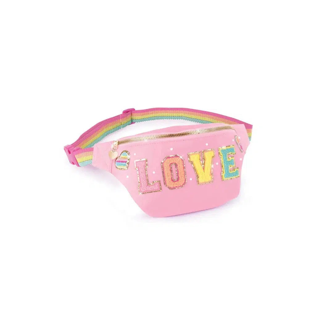 Pink bum bag with "LOVE" in colorful letters, gold accents, and a rainbow-striped adjustable strap—a DIY fashion statement.