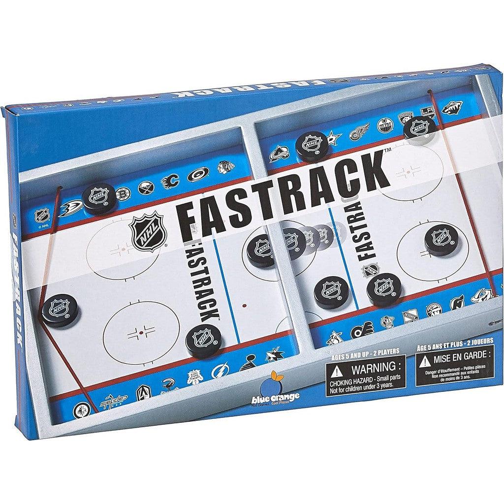 Box of Fastrack NHL wooden ice hockey game featuring a blue and white ice rink design, visible pucks, and logos. Includes a warning about small parts for children under three. This dexterity puck sliding game is suitable for ages 5 and up, designed for 2 players.