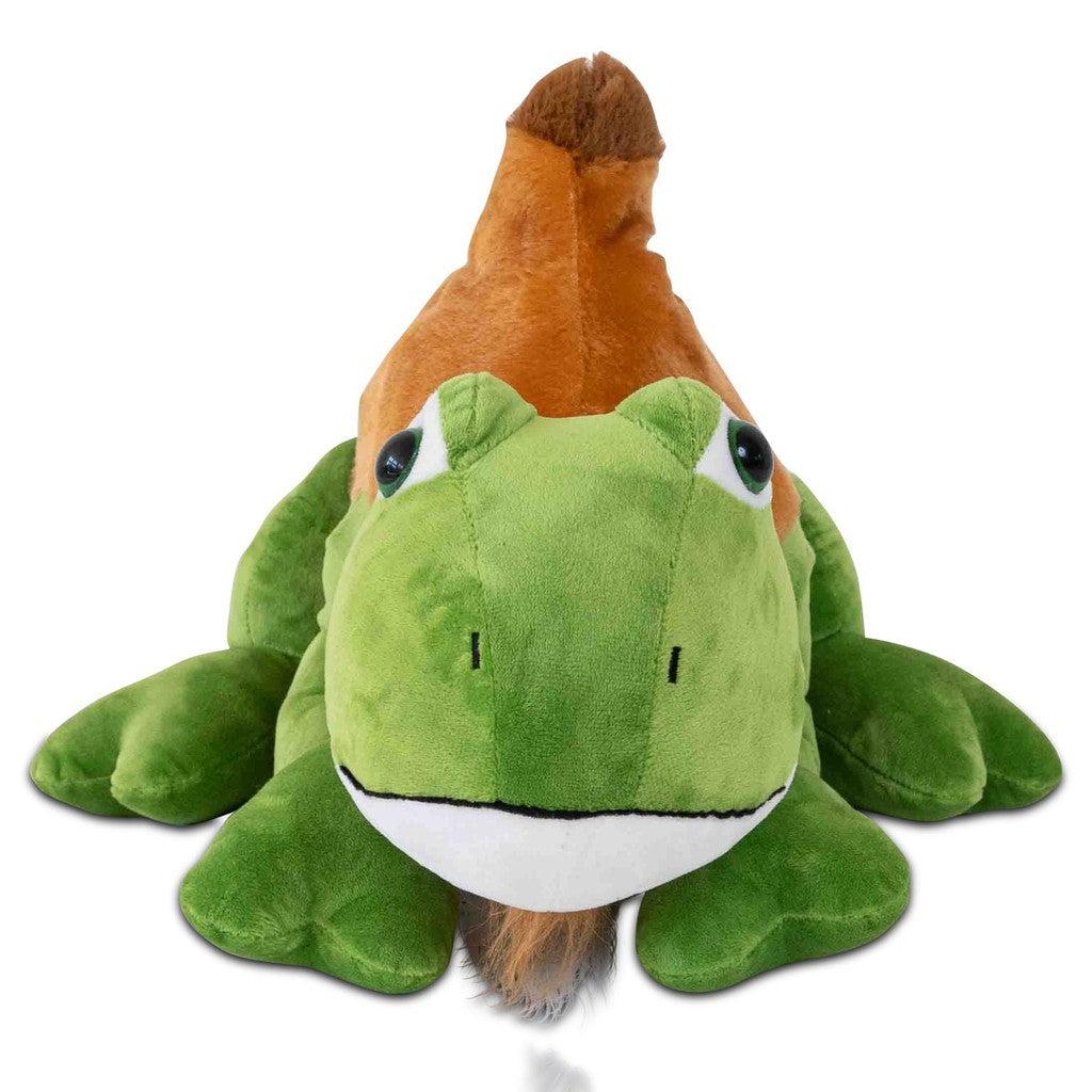 A plush toy from the Randimals collection, resembling a dinosaur with a green body and brown ridge, is positioned on a white surface.