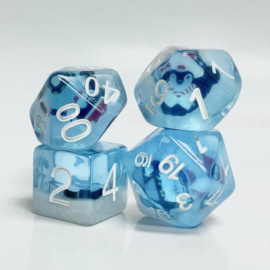 A set of four translucent teal dice with white numbers, featuring enchanting small penguin designs inside each die, perfect for your next Dungeons and Dragons adventure.