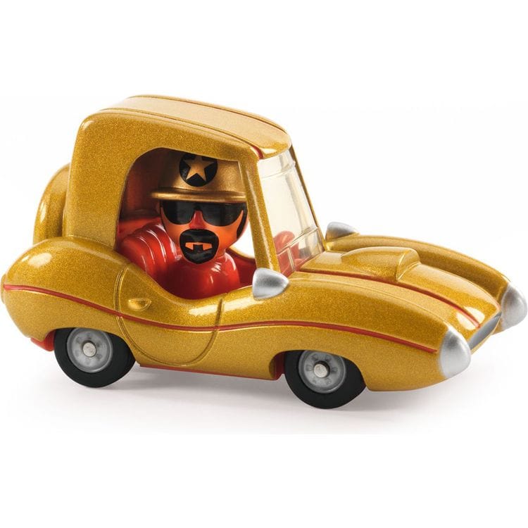 A small toy car with a golden star exterior showcases its brilliance, featuring a figure wearing sunglasses and a hat inside.