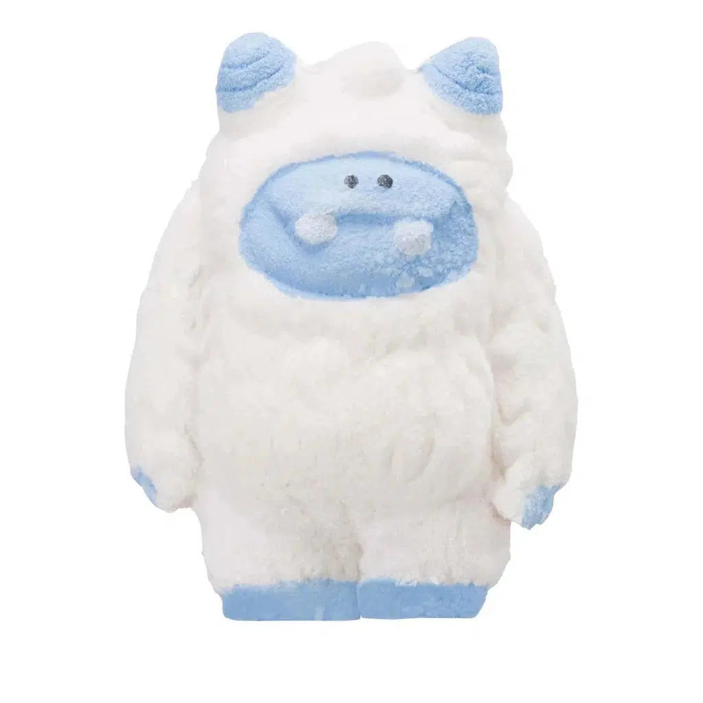 A plush DIY grow toy, this fluffy Yeti boasts blue accents on its feet, hands, and face—perfect for the winter holidays.