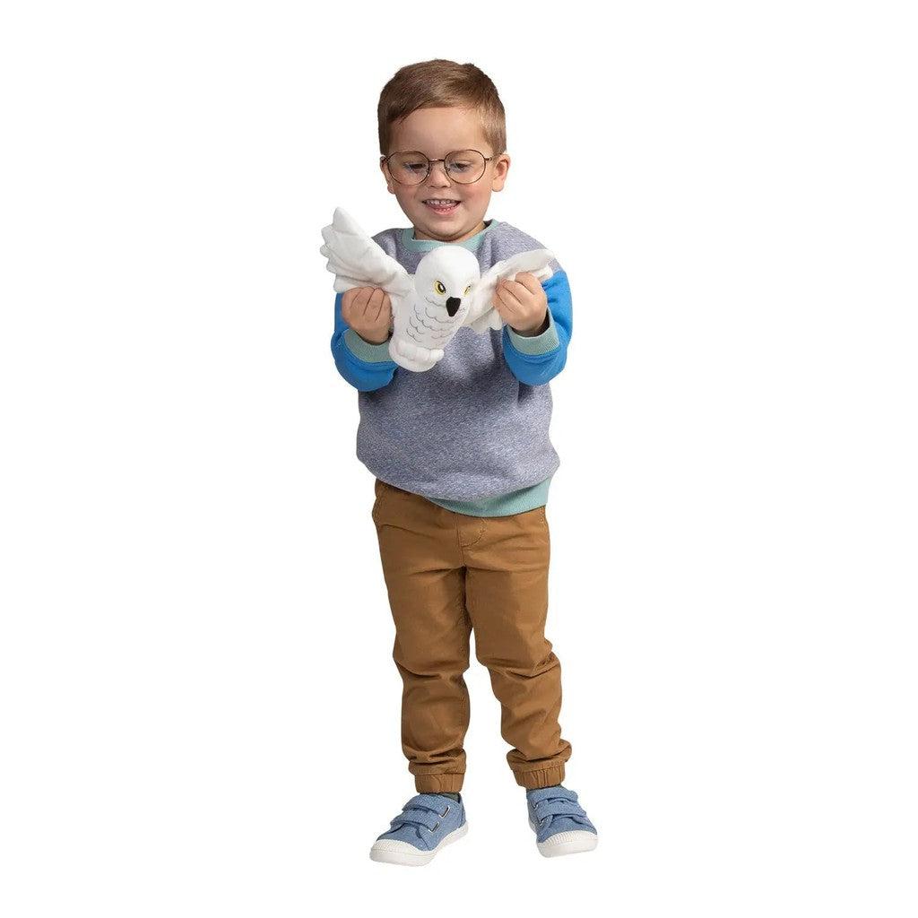 Hedwig Lego Plush-Manhattan Group-child holding Hedwig plush