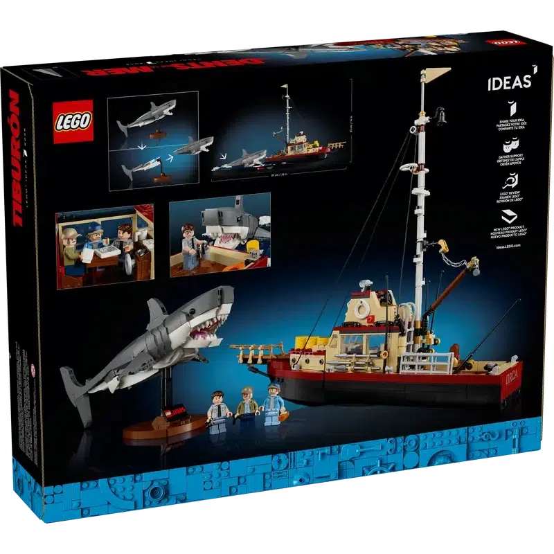 The LEGO Ideas Tiburón set box is a perfect piece of memorabilia for Jaws movie enthusiasts, showcasing a boat, a menacing shark, and three mini-figures. It includes detailed build illustrations and features an iconic scene with figures gathered at a table.