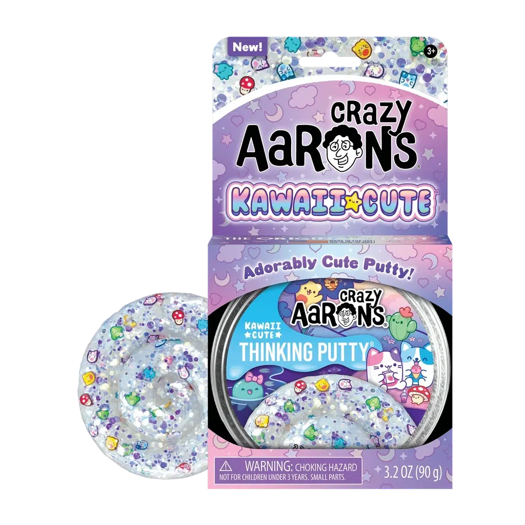 A box with a tin of crazy aaron's kawaii cute putty. the putty is clear with silver sparkles and colorful critters inside