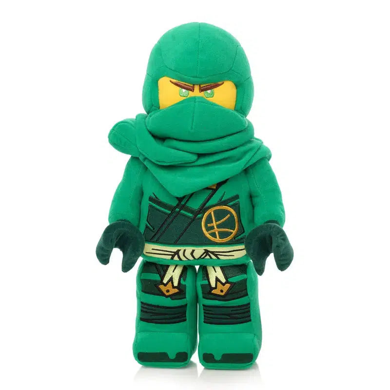 A plush toy resembling a green ninja character from the NINJAGO universe, featuring green eyes and sporting a hood and scarf.