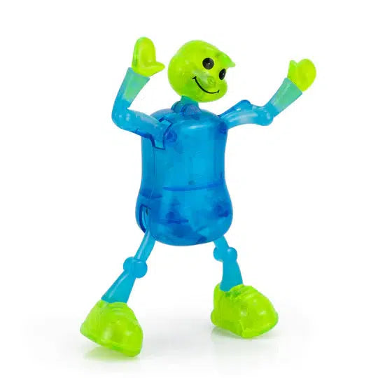 A small blue and green plastic toy figure with movable joints and a smiling face stands in an animated pose, ready for dynamic action.