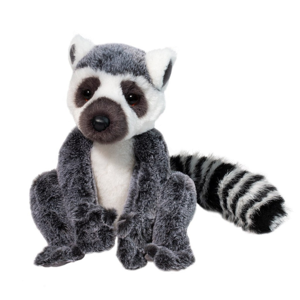 A plush friend, this charming raccoon toy with gray and white fur and a striped tail sits upright against a plain background, reminiscent of the delightful ring-tailed lemur from Madagascar.