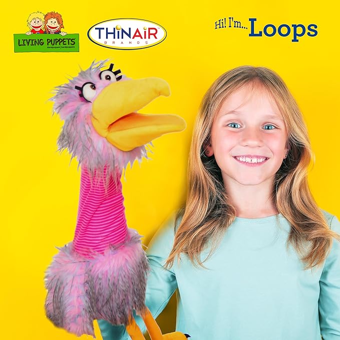 Girl holding Loops the puppet