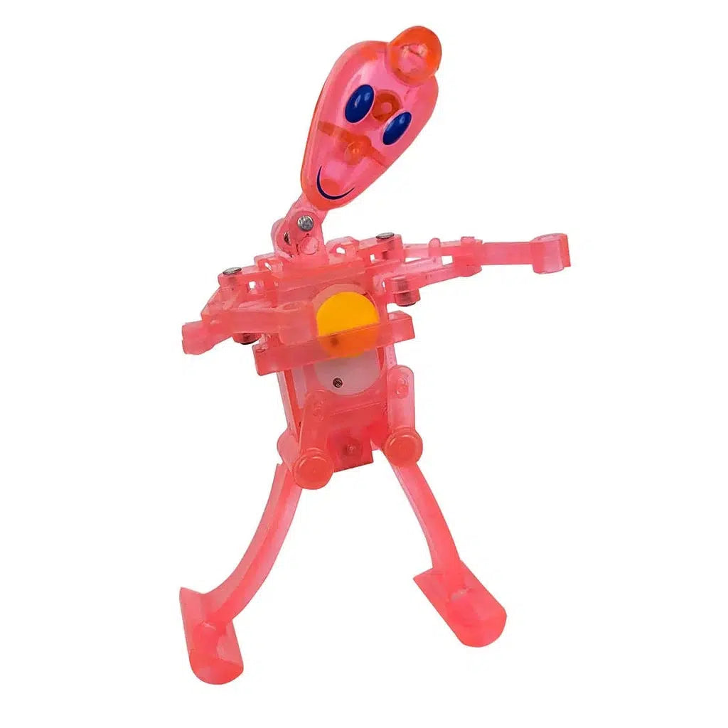 A pink, translucent children's toy robot with a smiling face and movable limbs stands proudly on two legs, echoing the charm of a Z WindUps Noggin Bop.