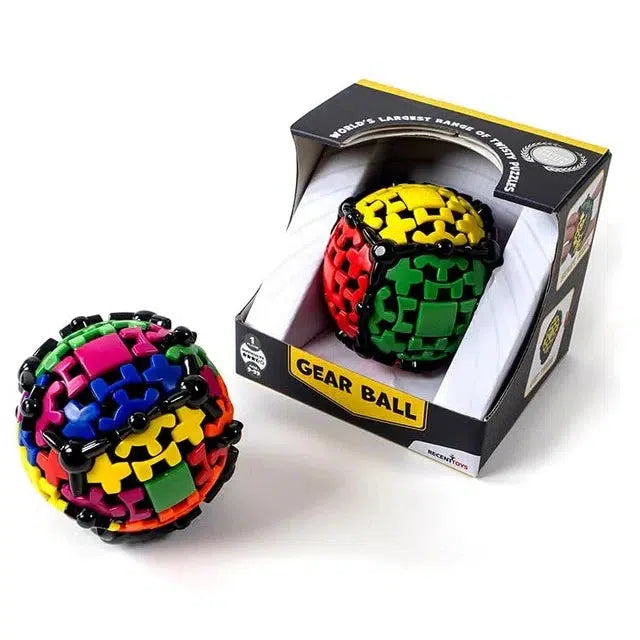 Next to its box, a multicolored gear ball puzzle is displayed. This twisty puzzle, known as Meffert's Gear Ball, showcases interlocking gears in vibrant colors: red, green, blue, yellow, and pink. Created by Uwe Meffert, it's a fascinating challenge for puzzle enthusiasts.