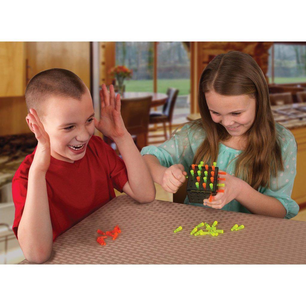 Scene of two young kids playing with the game.