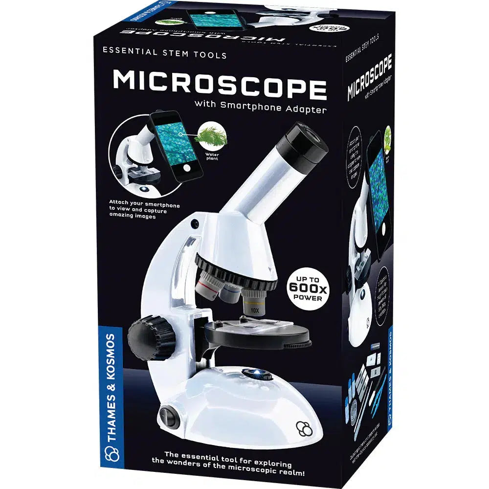 A student microscope kit with a smartphone adapter in its packaging. Text on the box reads "Essential STEM Tools," "Up to 600x Magnification," and includes Thames and Kosmos branding.