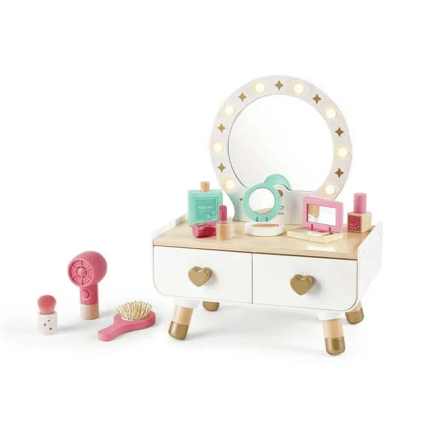 A toy vanity set featuring a light-up dressing table, mirror, two drawers with heart-shaped knobs, and various colorful accessories, including a hairbrush, hairdryer, and makeup items. Perfect for an imaginative playtime and a delightful makeup experience.