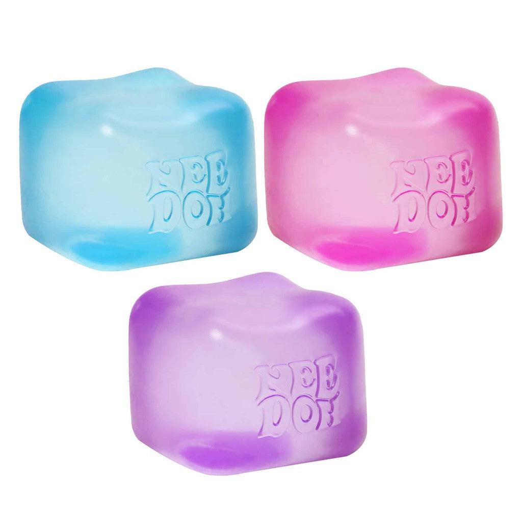 Three colorful stress balls with "NEE DOH" embossed, perfect for sensory squish. Available in blue, pink, and purple, they offer endless fun for stretching and squeezing.