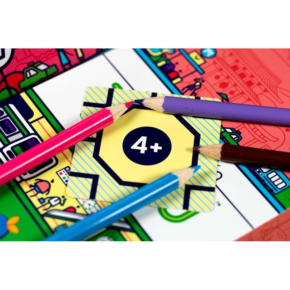 Four colored pencils (pink, blue, purple, brown) encircle a square card with "4+" printed on it, placed on a colorful board game.