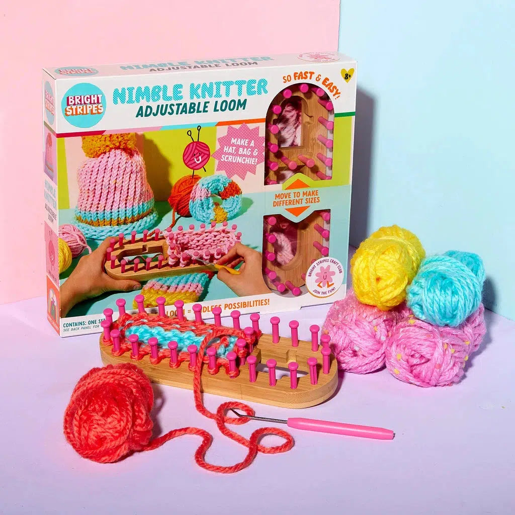 The Nimble Knitter Adjustable Loom kit includes chunky yarn balls, a versatile loom, and a handy tool. The box showcases projects like a cozy hat and scarf.