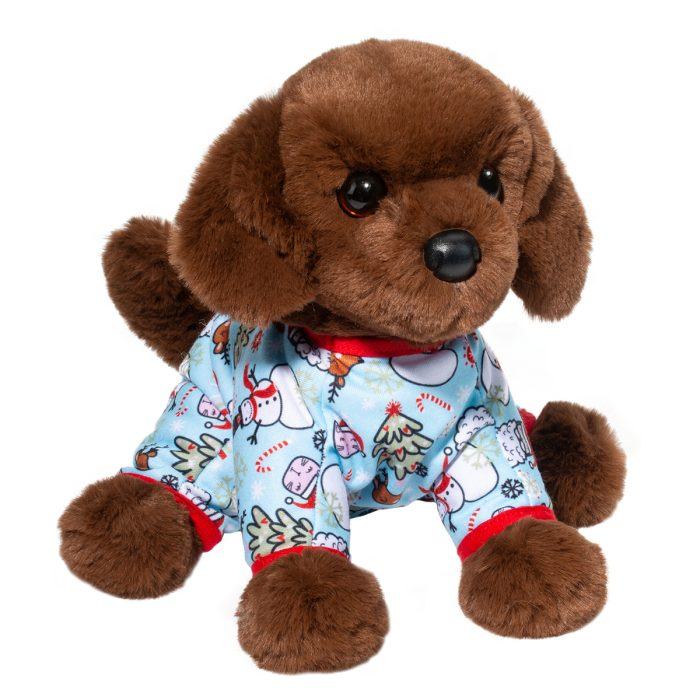 A brown plush dog toy, reminiscent of a Chocolate Lab stuffed animal, dons blue pajamas with a festive pattern featuring snowmen and trees. This holiday plush puppy is perfect for adding cheer to your matching family PJ tradition.