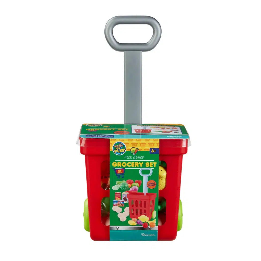 A red toy grocery cart with a gray handle and green wheels is perfect for pretend play. Filled with packaged pretend food, the packaging reads "Grocery Set," making it ideal for young shoppers engaging in imaginative role-playing adventures.