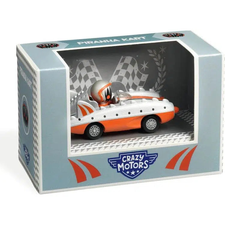 Toy car in a display box labeled "Piranha Kart," featuring a cartoon character in an orange and white go-kart with ultrasonic metallic paint. Box also displays the "Crazy Motors" logo.