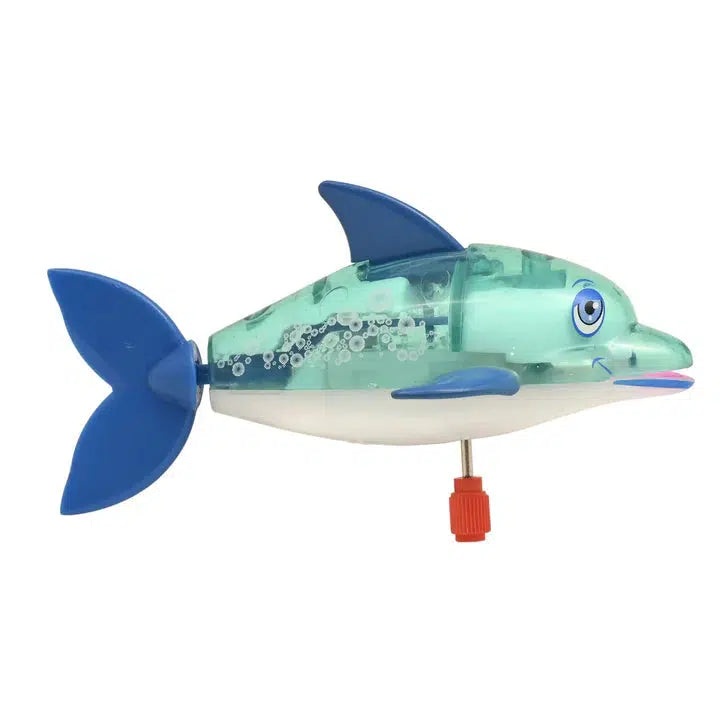 A bath time toy, this swimming fish boasts a blue tail and transparent green body revealing internal gears. With a smiling face and red wind-up mechanism underneath, it promises endless water play fun.