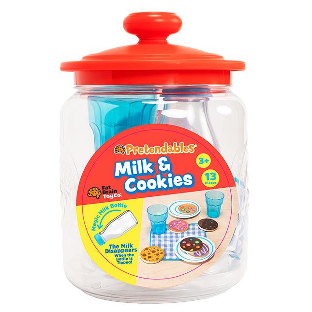 Toy cookie jar labeled "Pretendables Milk &amp; Cookies," with a visible orange lid and illustrations of cookies and a milk bottle. Contains 13 pretend pieces, suitable for ages 3 and up.