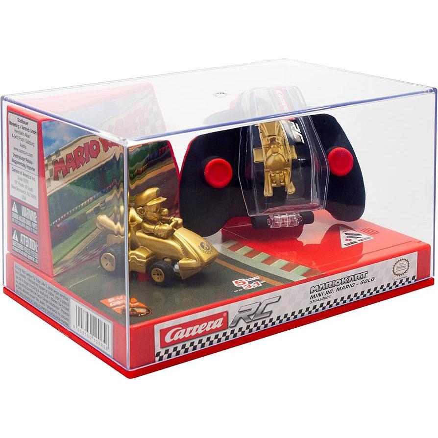 Gold Mario Kart figure and remote control in a transparent display box, labeled "Carrera RC," with a Mario Kart backdrop.