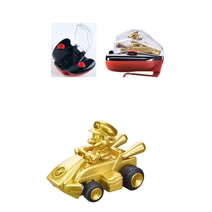 Gold Mario Carrera mini rc car with controller that has a place to store mario